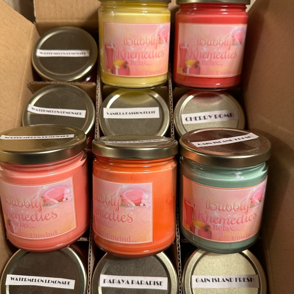 Variety pack of 9 oz candles a total of 12